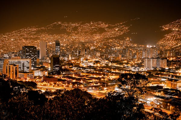 Medellín city lights at night showing the urban valley