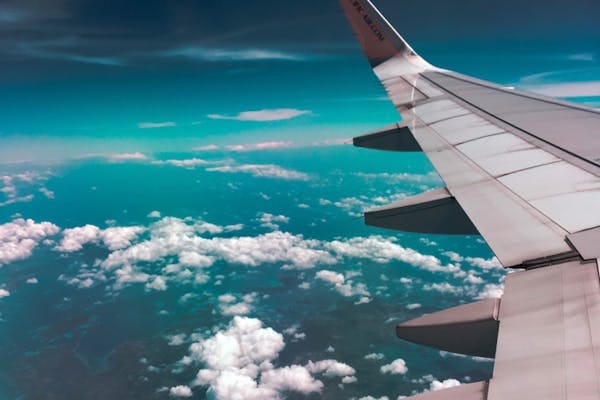 Airplane window view — finding cheap flights to Medellín Colombia