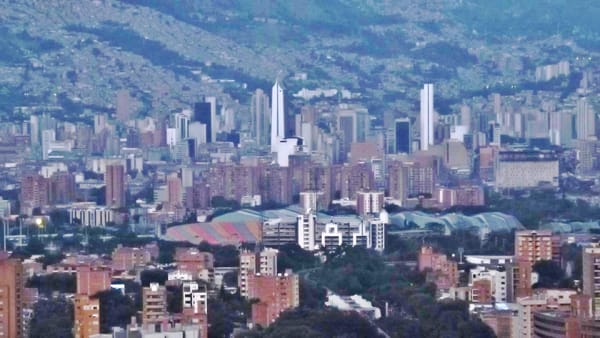 Panoramic aerial view of Medellín Colombia showing the city and surrounding mountains